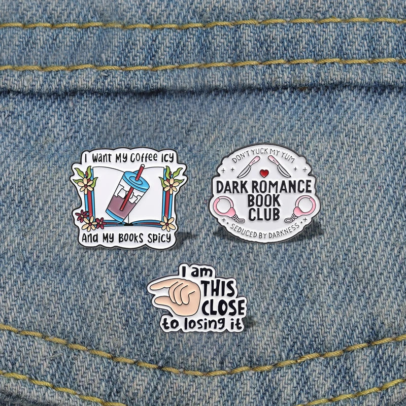 Enamel pins for book lovers.  Choice of designs.