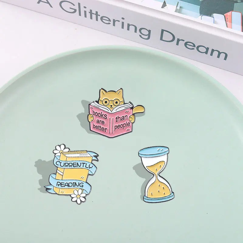 Enamel pins for book lovers.  Choice of designs.