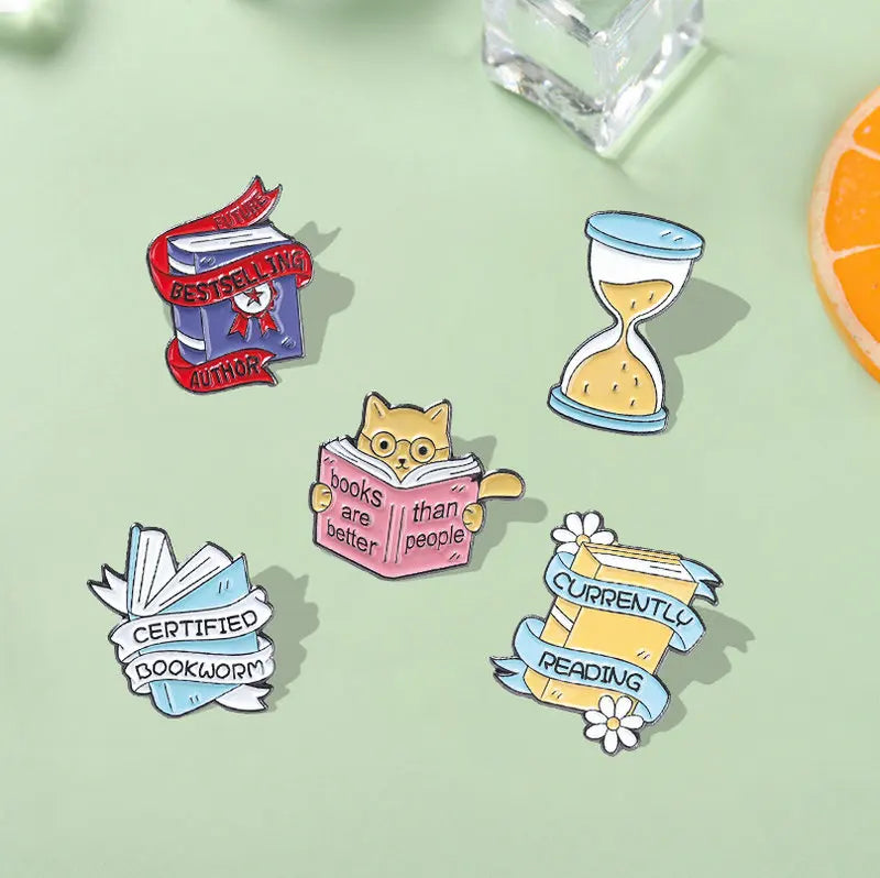 Enamel pins for book lovers.  Choice of designs.