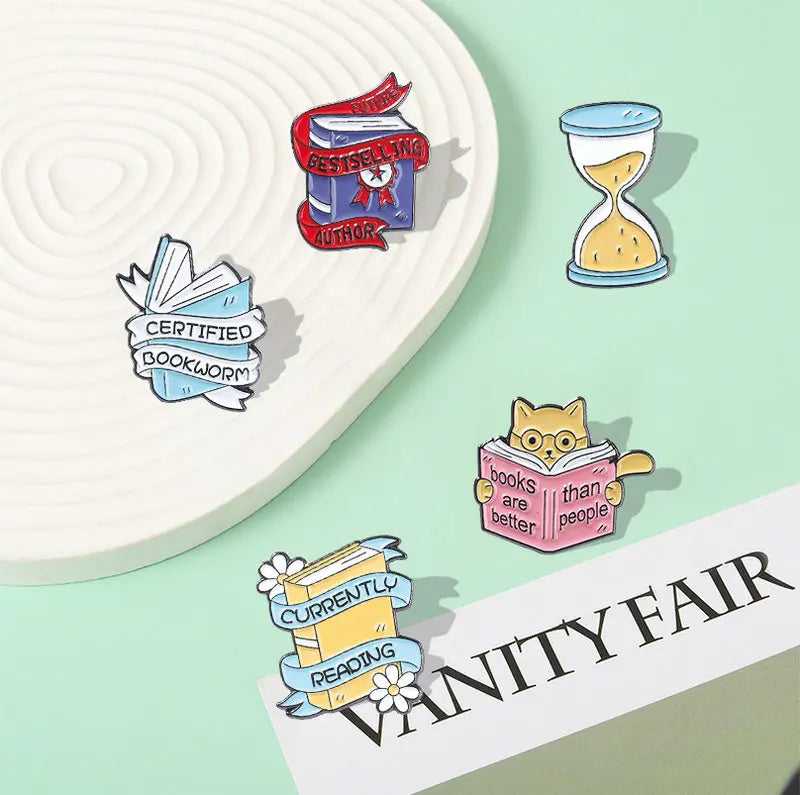 Enamel pins for book lovers.  Choice of designs.